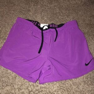 Purple Dri-Fit Nike running shorts